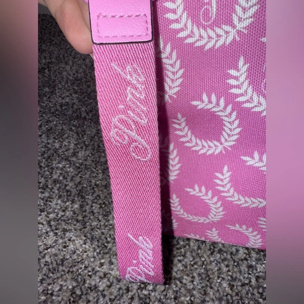 Pink - pink wristlet with pink logo